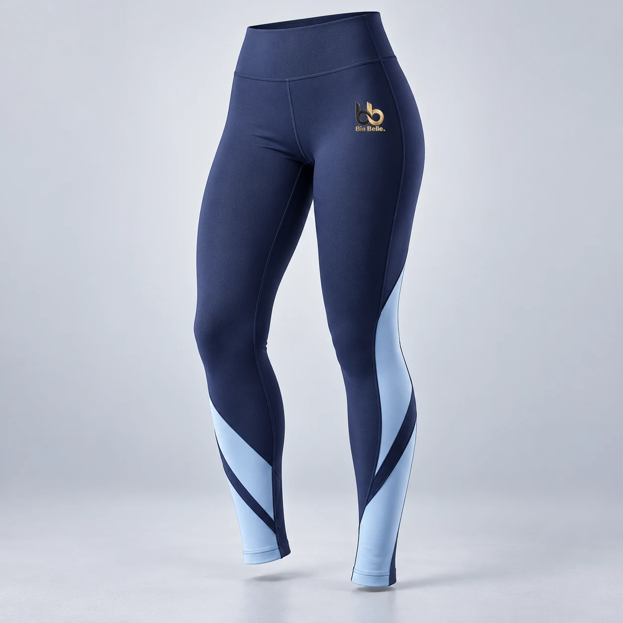 Cycling leggings — inky indigo with ice blue lower-leg geometric panels